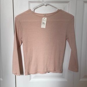 3/4 sleeve , slightly cropped